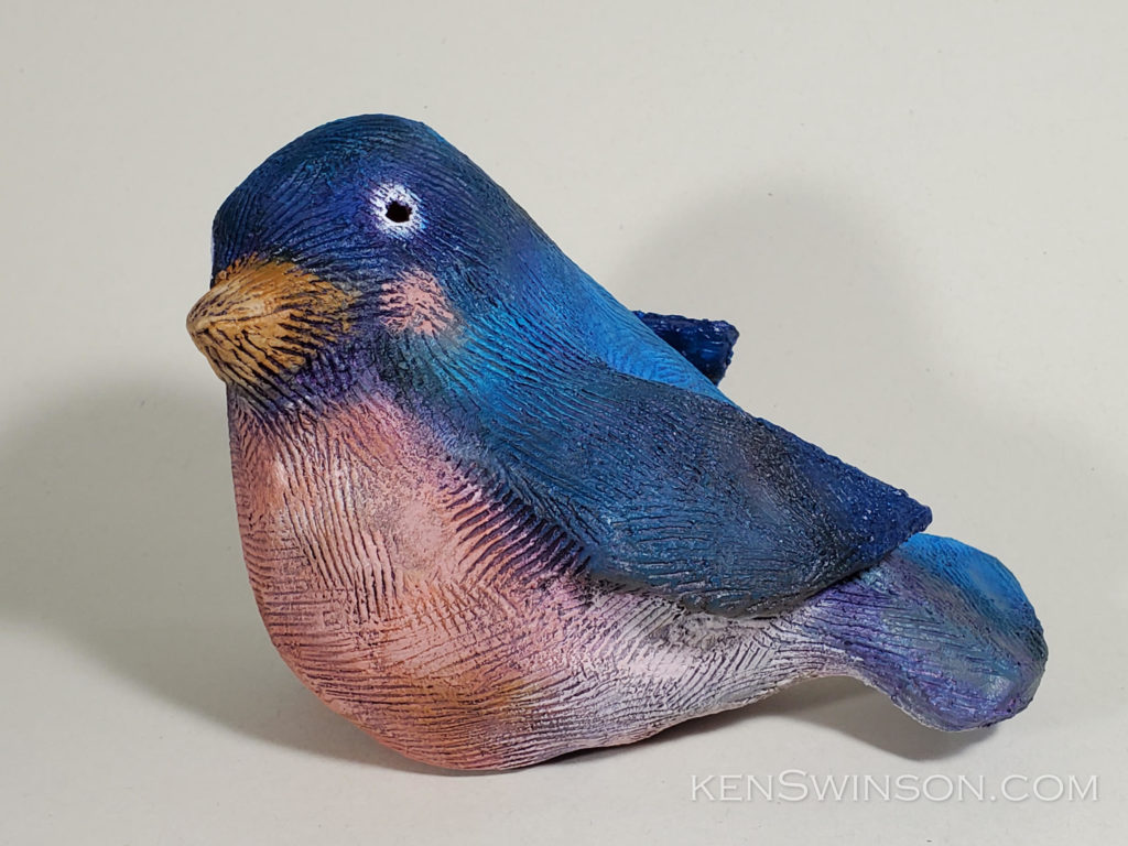 sculpture of blue bird