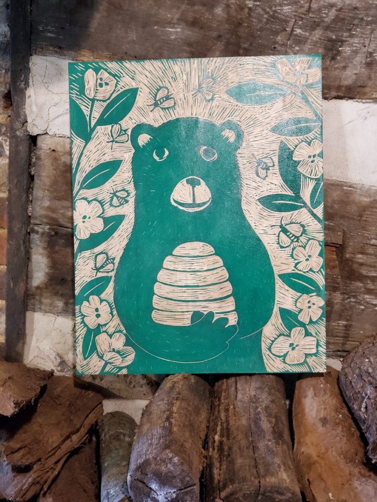 carved woodcut of a honeybear. ready to print!