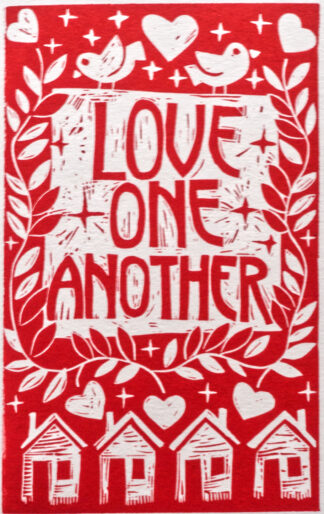 red linocut with houses and hearts with text Love One Another