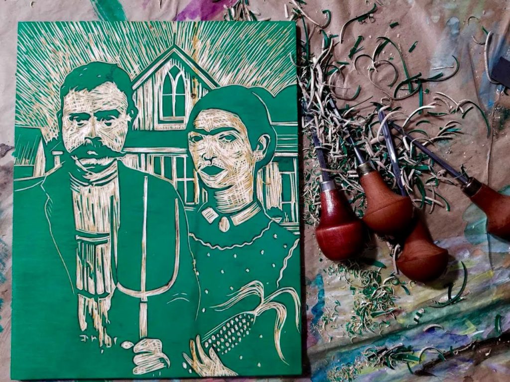 woodcut of frida and zapata by artist ken swinson