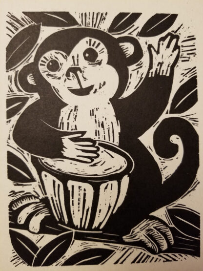 woodcut notecard of monkey playing a drum