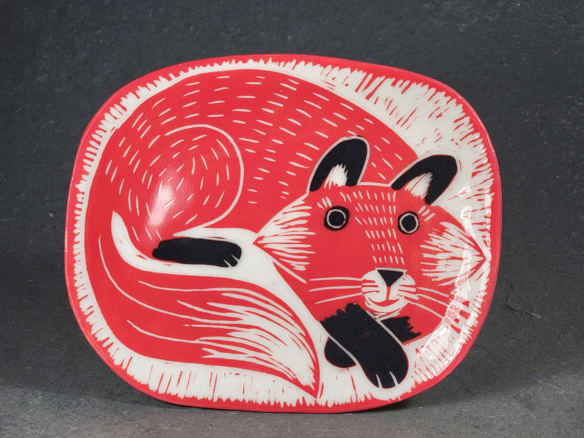 folk art style porcelain plate of a fox