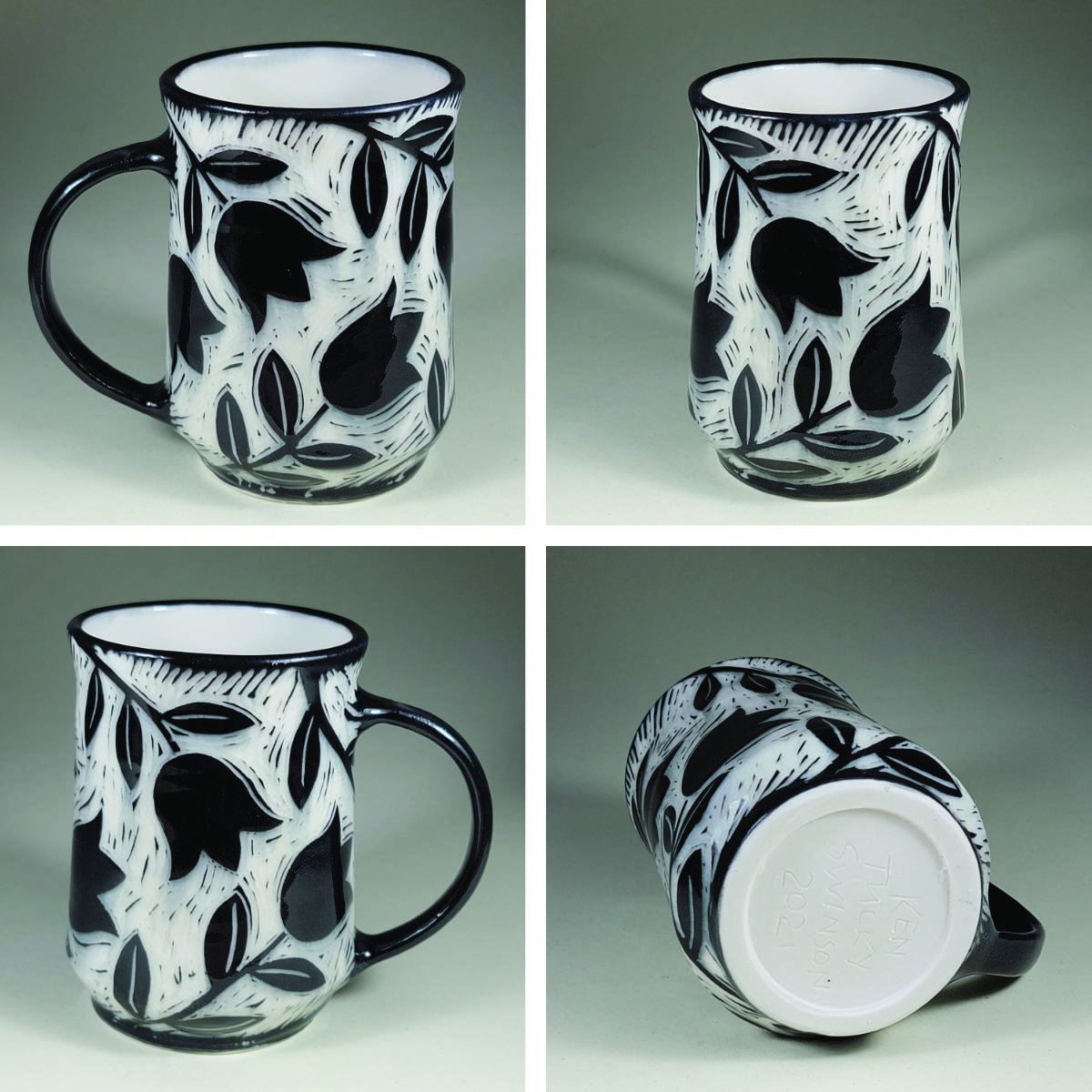 porcelain cup with black sgraffito designs of tulip flowers