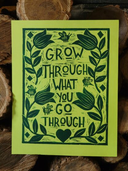 Woodcut with quote: Grow Through What You Go Through