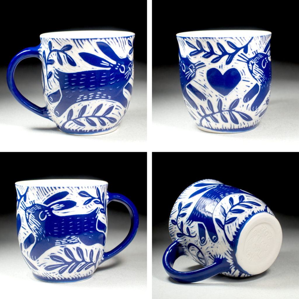 porcelain cup with bunny and heart blue by kentucky artist ken swinson