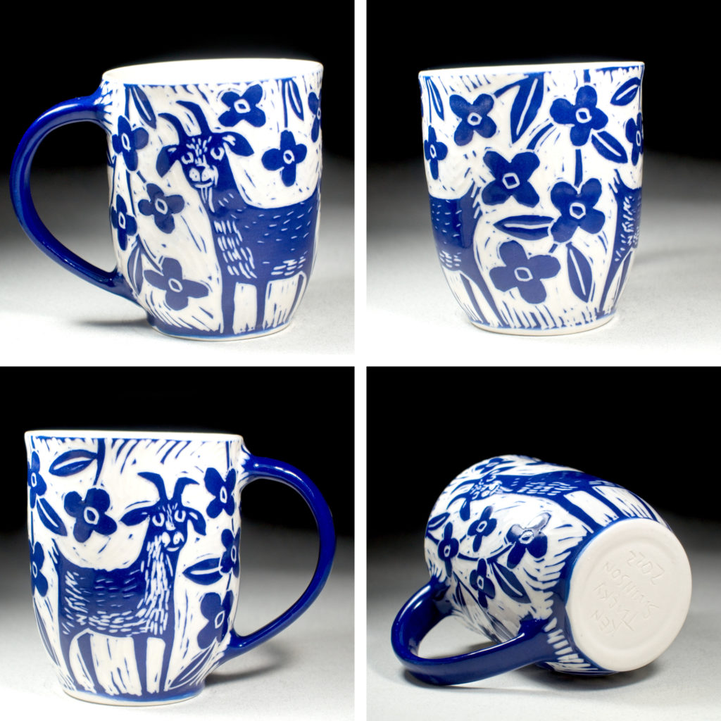 porcelain blue cup with goat and flowers by kentucky artist ken swinson