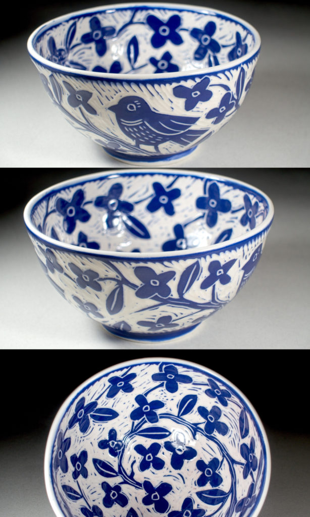blue porcelain bowl with intricate blue flower and bird design by kentucky artist ken swinson