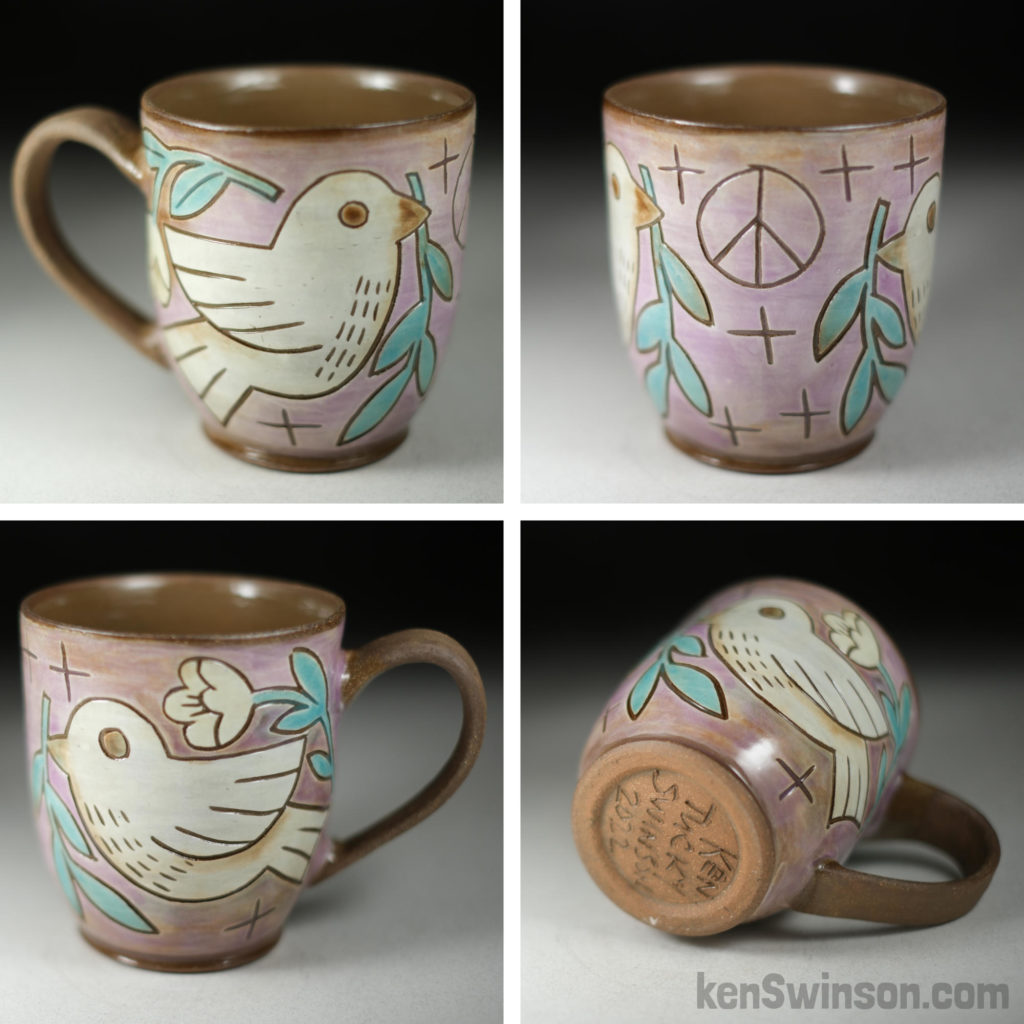 handmade stoneware cup with purple peace dove surface design