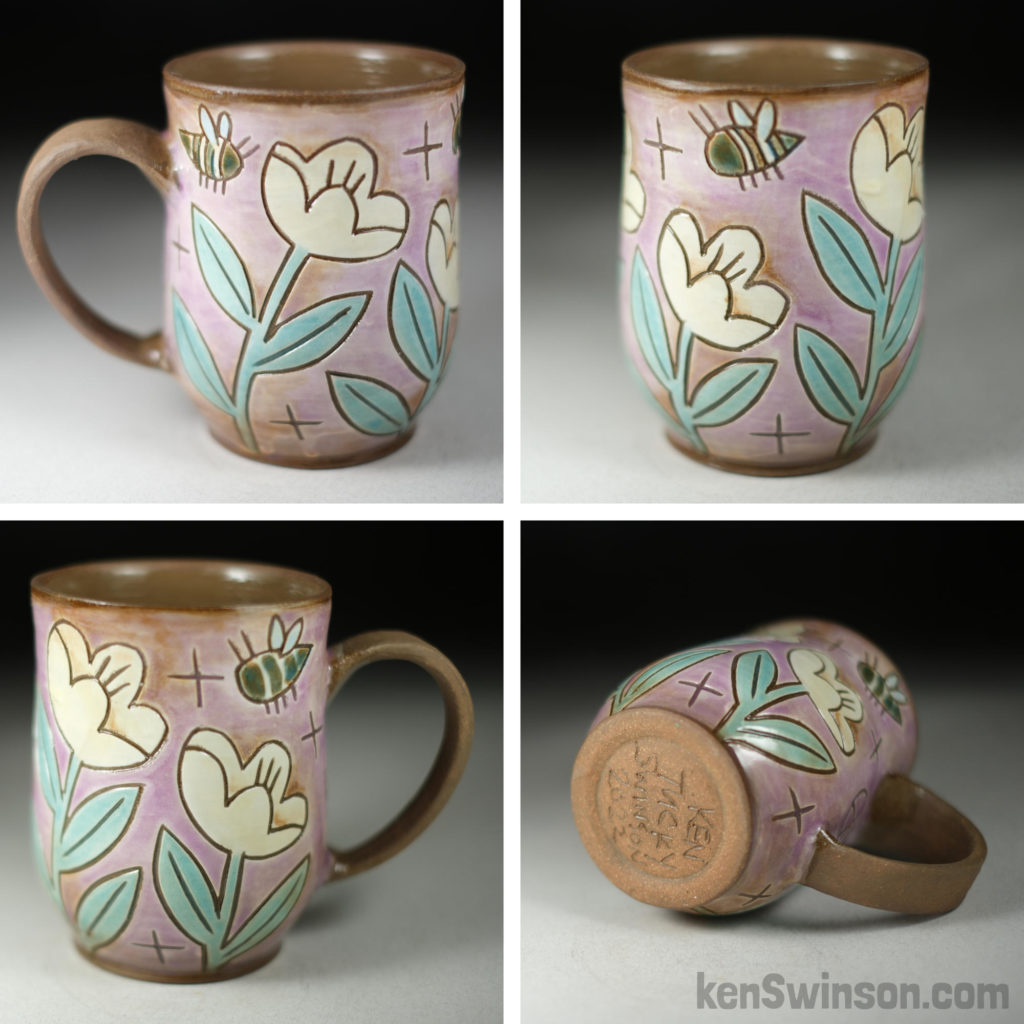 handmade stoneware cup with purple flower and bee surface design