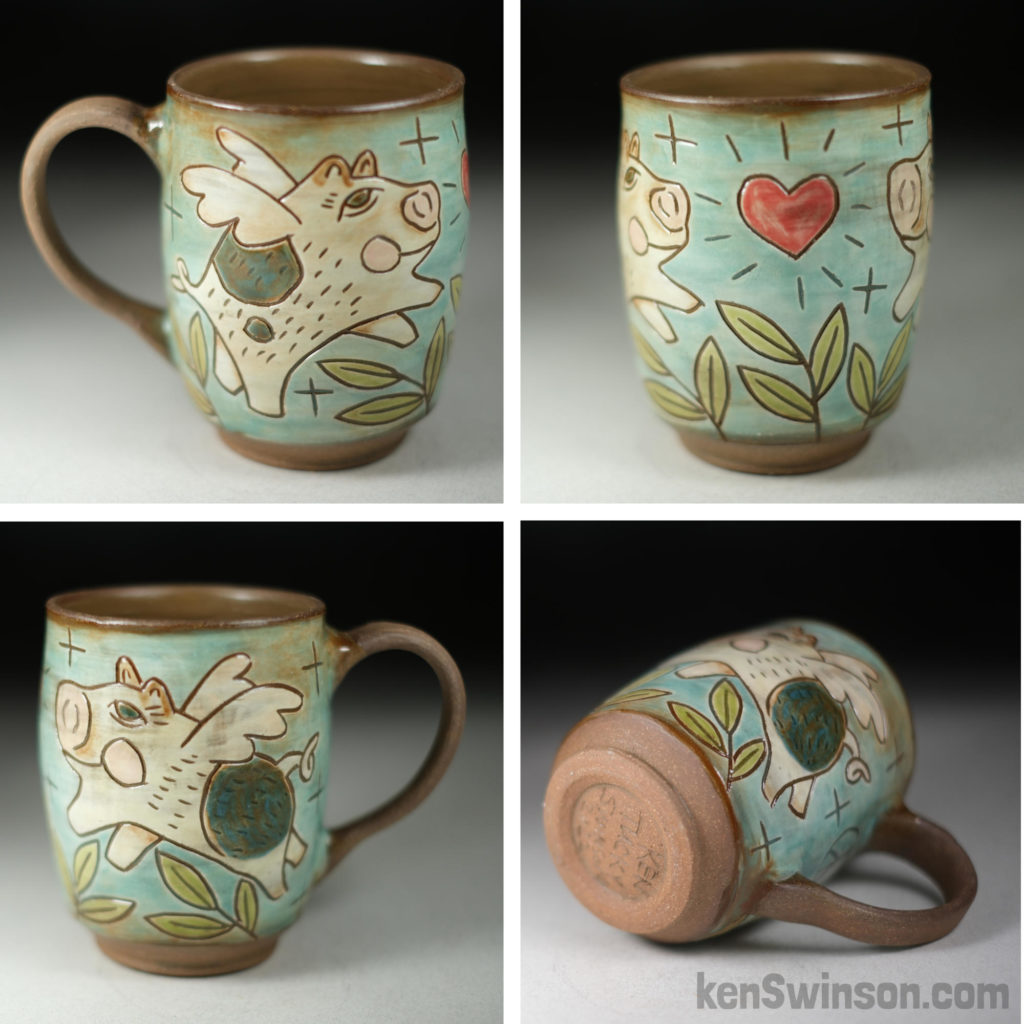 handmade stoneware cup with flying pig surface design