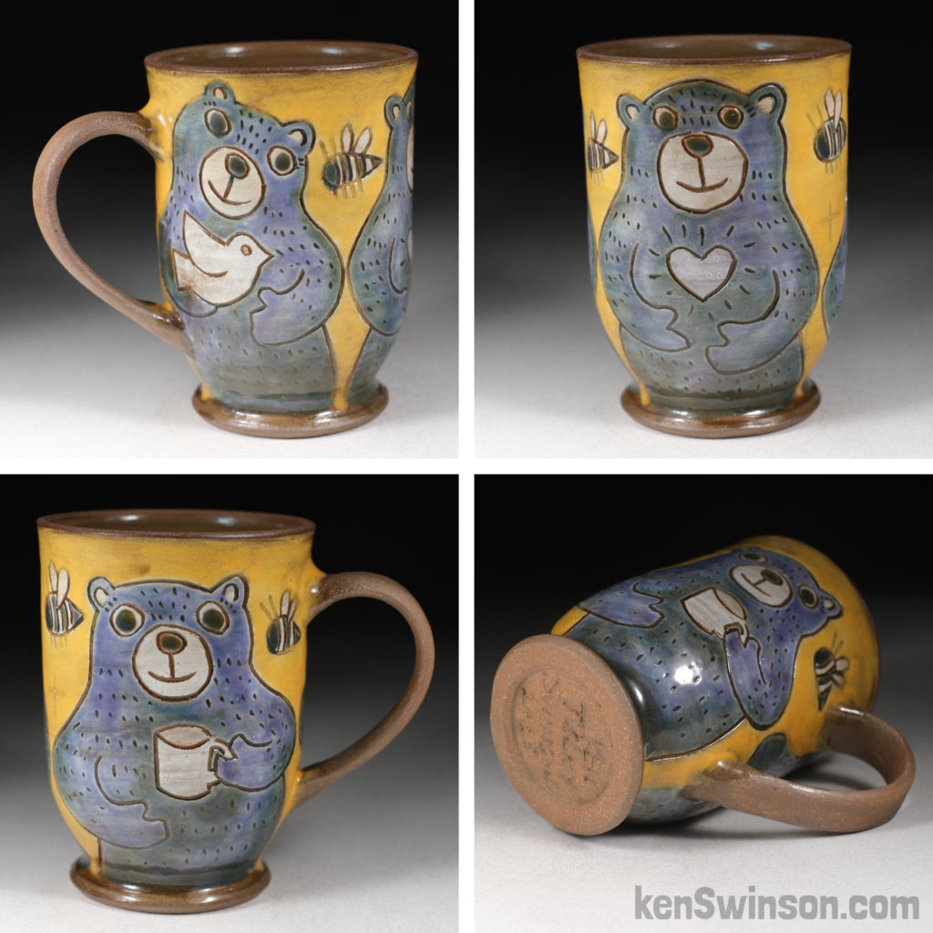 handmade stoneware cup with bears holding dove, heart and coffee cup