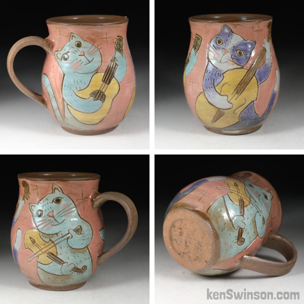 handmade stoneware cup with cats playing guitar, bass and fiddle