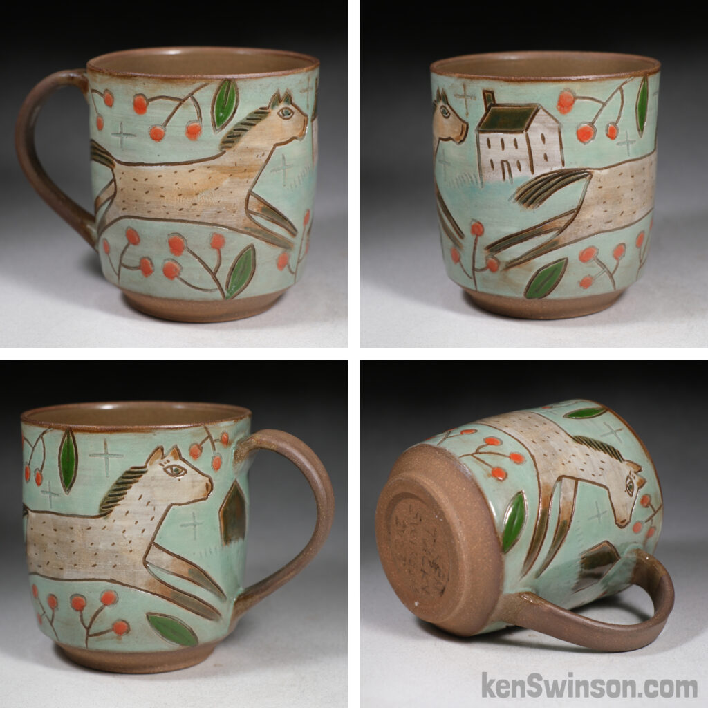 handmade stoneware cup with folk art surface design of a horse and country house