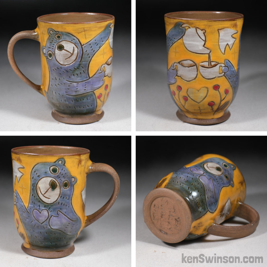 handmade stoneware cup with bear having a tea party design