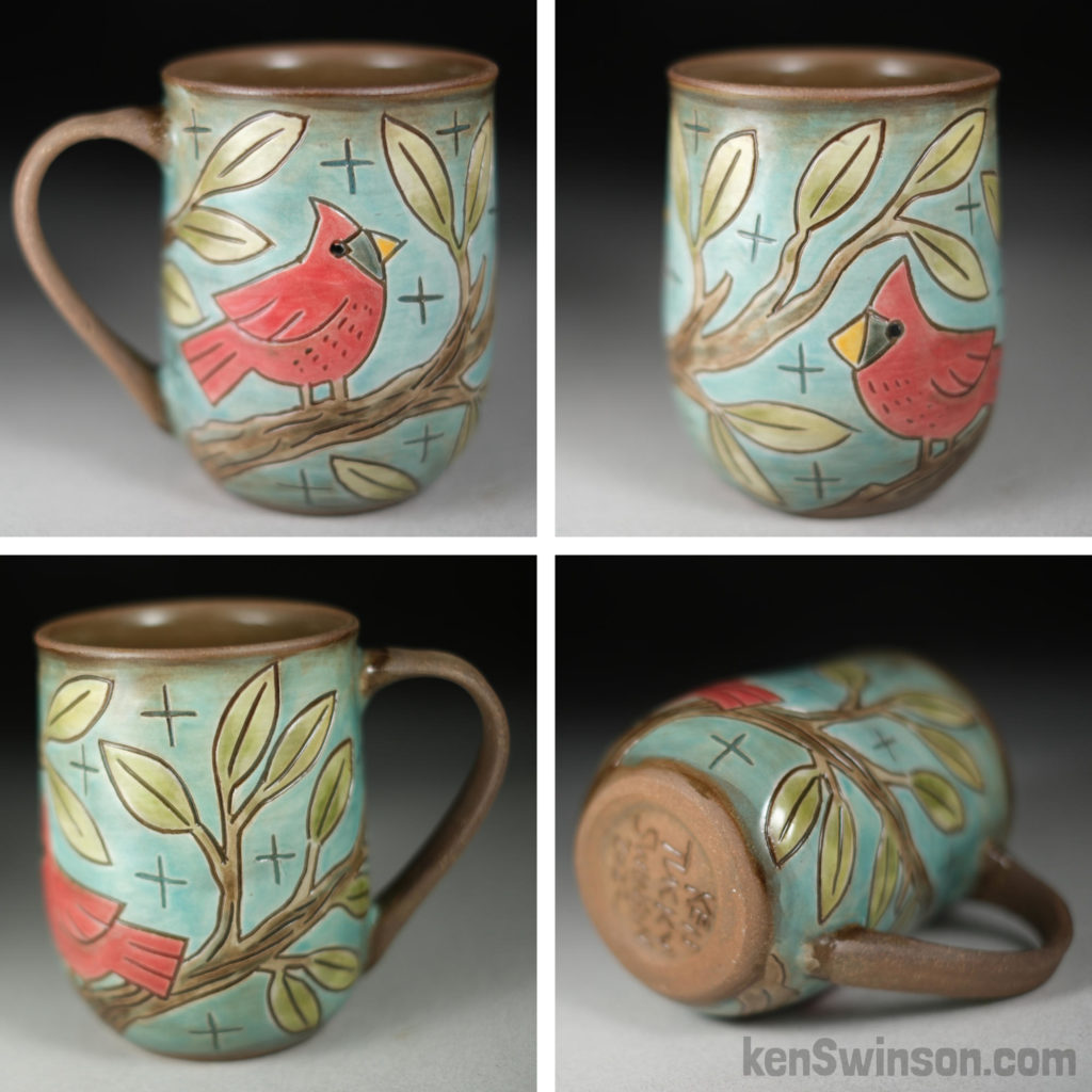 handmade stoneware cup with cardinal surface design