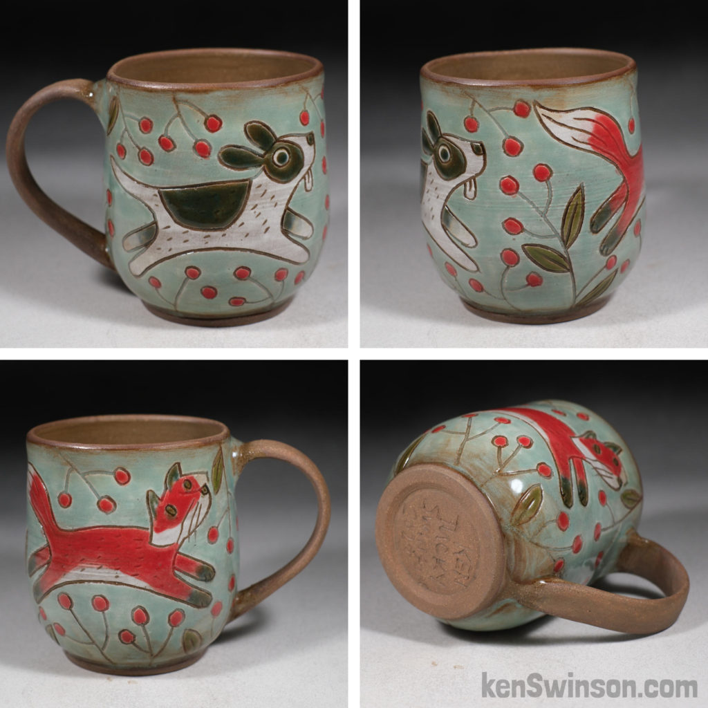 handmade stoneware cup with fox and hound surface design