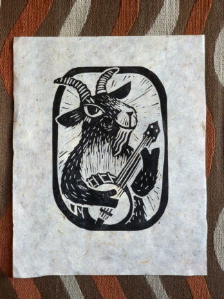 handprinted linocut depicting a goat playing a banjo.