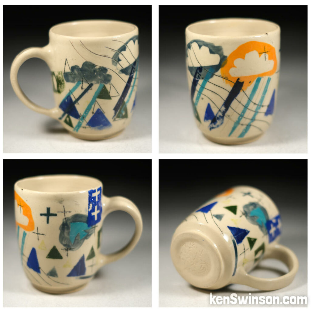 pottery cup with storm cloud designs