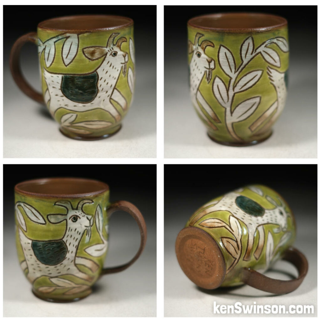 folk art style pottery cup with goat and leaves design