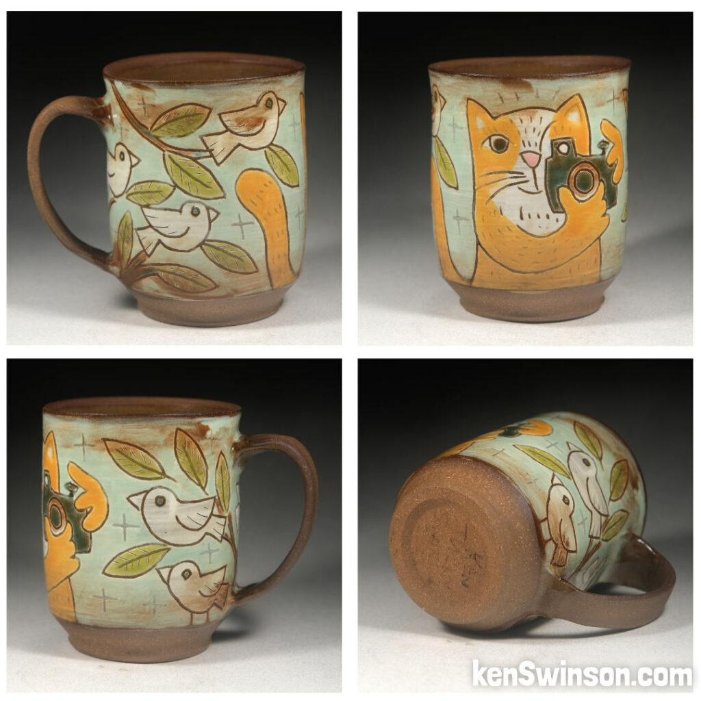 folk art pottery wheel thrown cup made in kentucky with a yellow cat taking photos of birds on the surface design