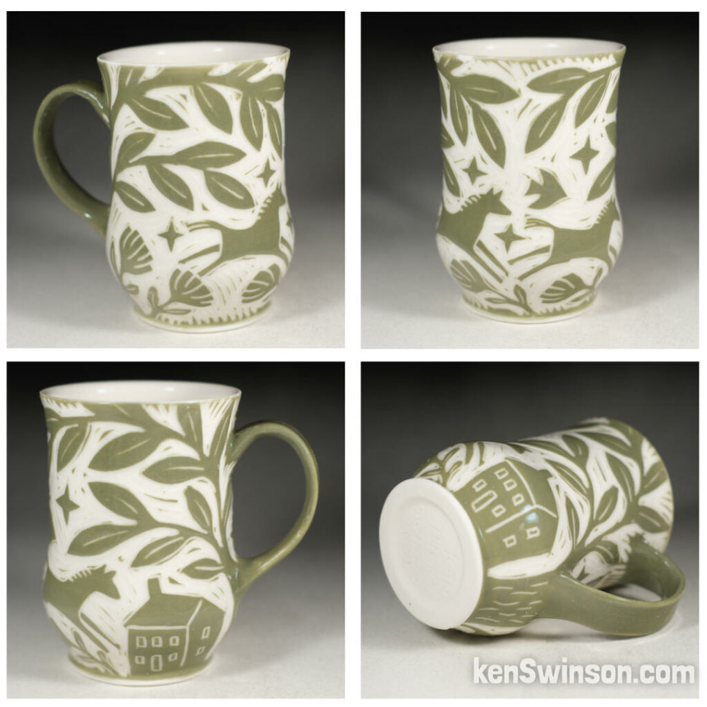 handmade porcelain cup by kentucky artist ken swinson. surface design is olive with horses running around a house