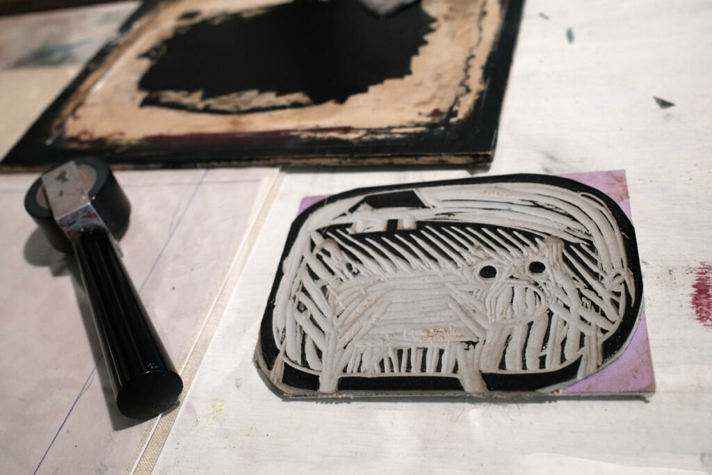 a photo of a reduction linocut with only the last part of the print remaining